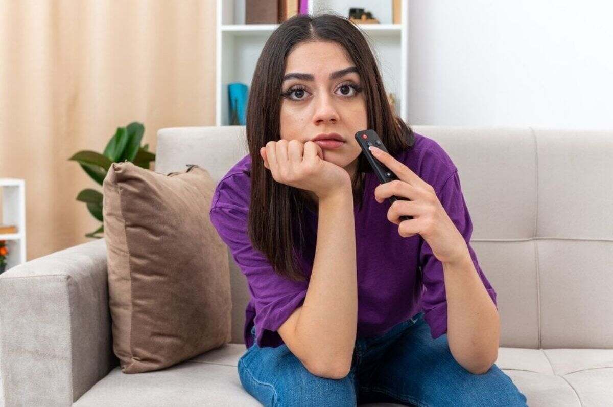 IPTV in Canada 2 A person streaming IPTV on a smart TV in Canada.